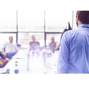 people around a conference room table