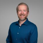 Headshot of Aaron Blom.