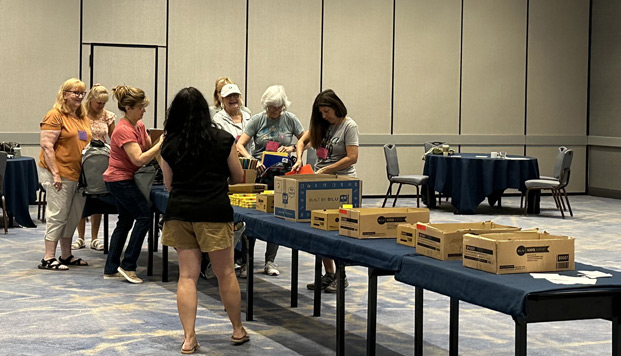 2024 Fall Conference guest attendees during backpack build