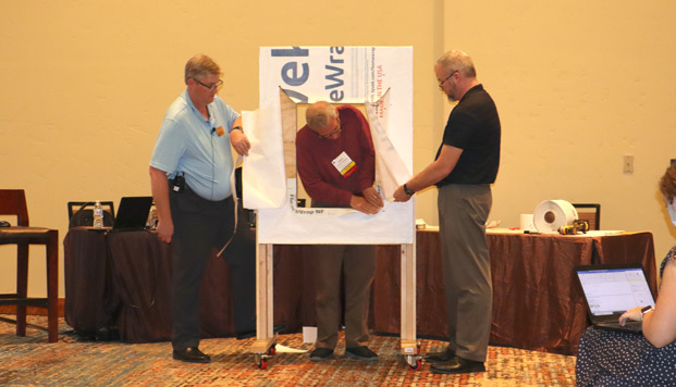 Rich Rinka, Jim Katsaros and Jason Seals demonstrate installation