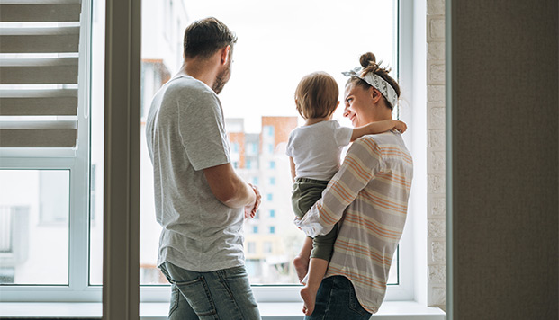 Window Safety Week family in front of window