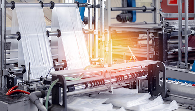 Closeup roller of industry machine for packaging